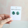Shop Monstera Leaf Stud Earrings-Lightweight monstera leaf cut-out studs made from plant-based acrylic. Hypoallergenic & handmade in the USA—perfect gift for plant lovers for everyday wear.-available at Reef Love online boho-chic boutique