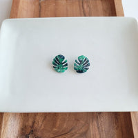 Shop Monstera Leaf Stud Earrings-Lightweight monstera leaf cut-out studs made from plant-based acrylic. Hypoallergenic & handmade in the USA—perfect gift for plant lovers for everyday wear.-available at Reef Love online boho-chic boutique