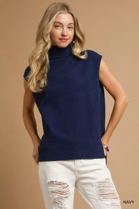 Navy High-Low Turtleneck Sleeveless Sweater-The Navy Blue High-Low Turtleneck Sleeveless Sweater is a stylish and versatile piece. The turtleneck adds a sophisticated touch to the sleeveless design. 
