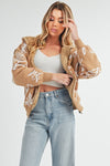 Shop Oita Floral Zip Front Hoodie-Cozy meets cool in the Oita Floral Zip-Up Hoodie - sherpa-lined warmth, bold floral print, and a bomber fit make this your new cold-weather go-to.-available at Reef Love online boho-chic boutique