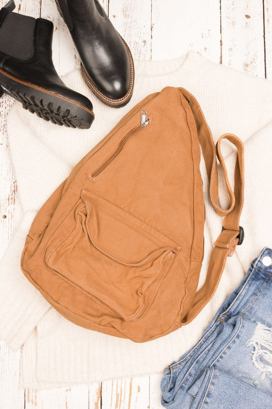 Oversized Canvas Sling Backpack-Oversized canvas sling backpack with adjustable strap and zip pockets. Lightweight, casual, and perfect for everyday or carrying travel essentials.-Reef Love