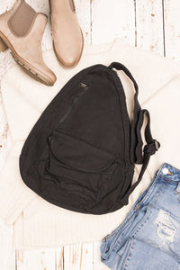 Oversized Canvas Sling Backpack-Oversized canvas sling backpack with adjustable strap and zip pockets. Lightweight, casual, and perfect for everyday or carrying travel essentials.-Reef Love
