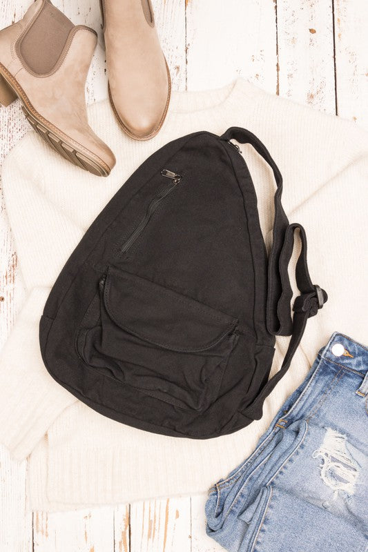 Oversized Canvas Sling Backpack-Oversized canvas sling backpack with adjustable strap and zip pockets. Lightweight, casual, and perfect for everyday or carrying travel essentials.-Reef Love