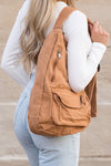 Oversized Canvas Sling Backpack-Oversized canvas sling backpack with adjustable strap and zip pockets. Lightweight, casual, and perfect for everyday or carrying travel essentials.-Reef Love