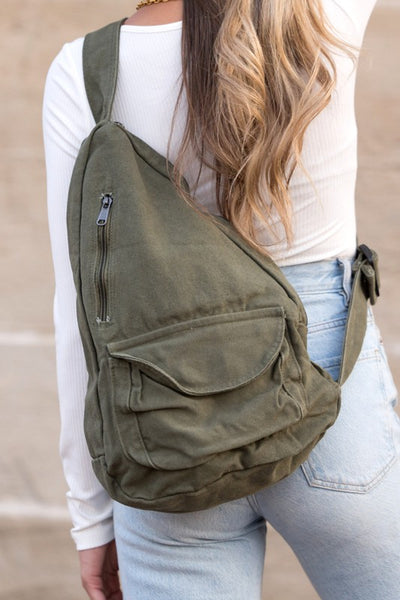 Oversized Canvas Sling Backpack-Oversized canvas sling backpack with adjustable strap and zip pockets. Lightweight, casual, and perfect for everyday or carrying travel essentials.-Reef Love