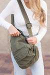 Oversized Canvas Sling Backpack-Oversized canvas sling backpack with adjustable strap and zip pockets. Lightweight, casual, and perfect for everyday or carrying travel essentials.-Reef Love