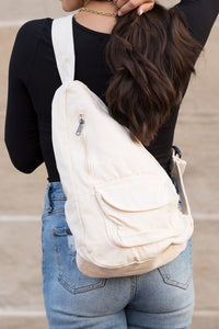 Oversized Canvas Sling Backpack-Oversized canvas sling backpack with adjustable strap and zip pockets. Lightweight, casual, and perfect for everyday or carrying travel essentials.-Reef Love