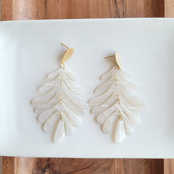 Shop Palm Earrings - Seashell Cream-Seashell cream palm leaf earrings with gold accents. Lightweight, tropical-inspired statement style—perfect for vacations, summer events, or everyday chic.-available at Reef Love online boho-chic boutique