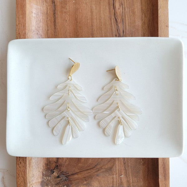 Shop Palm Earrings - Seashell Cream-Seashell cream palm leaf earrings with gold accents. Lightweight, tropical-inspired statement style—perfect for vacations, summer events, or everyday chic.-available at Reef Love online boho-chic boutique