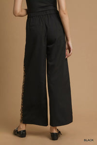 Pleated Wide-Leg Cropped Pants with Leopard Trim-Front Pleated Wide-Leg Cropped Pants with Leopard Trim, chic and sophisticated. The front pleats add a tailored touch to the pants with flattering silhouette. 