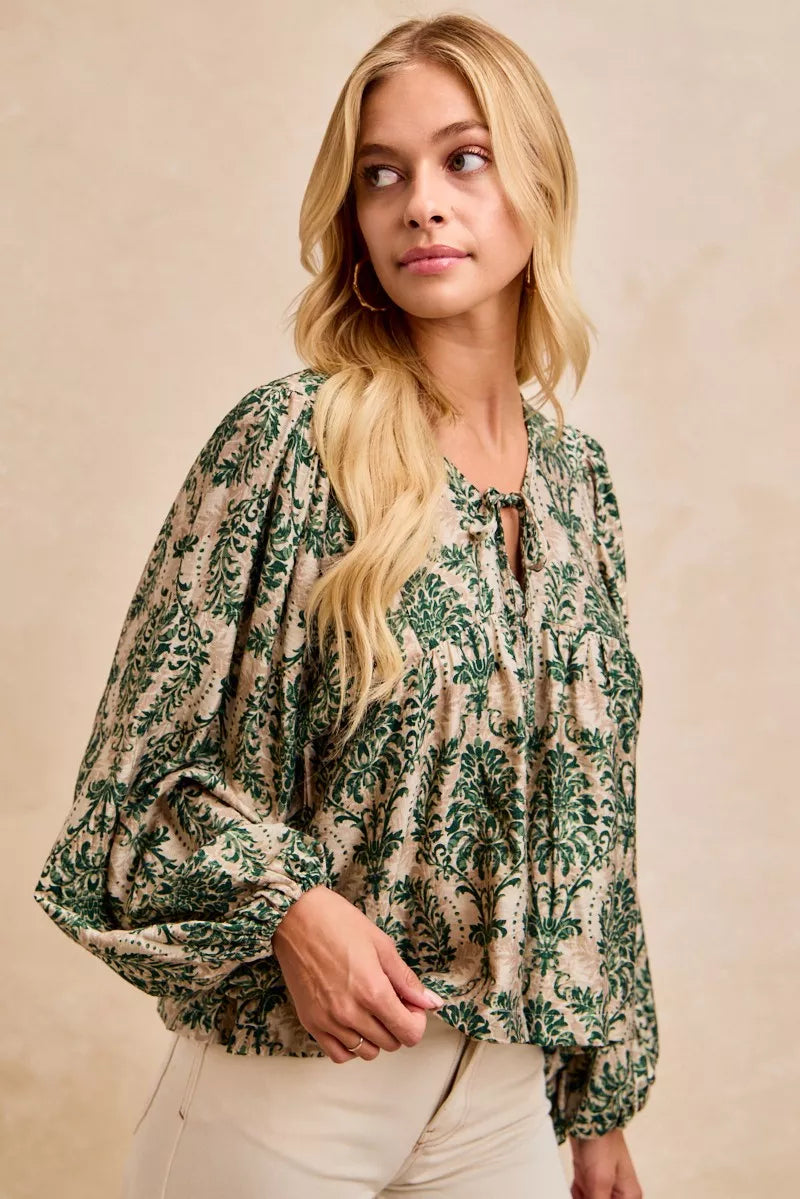 Printed Balloon Sleeve Front Tied Blouse-The printed woven front tied blouse with balloon sleeves is a stylish and feminine choice for adding a touch of flair to your outfit creating a flattering silhouette.