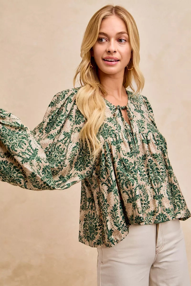 Printed Balloon Sleeve Front Tied Blouse-The printed woven front tied blouse with balloon sleeves is a stylish and feminine choice for adding a touch of flair to your outfit creating a flattering silhouette.