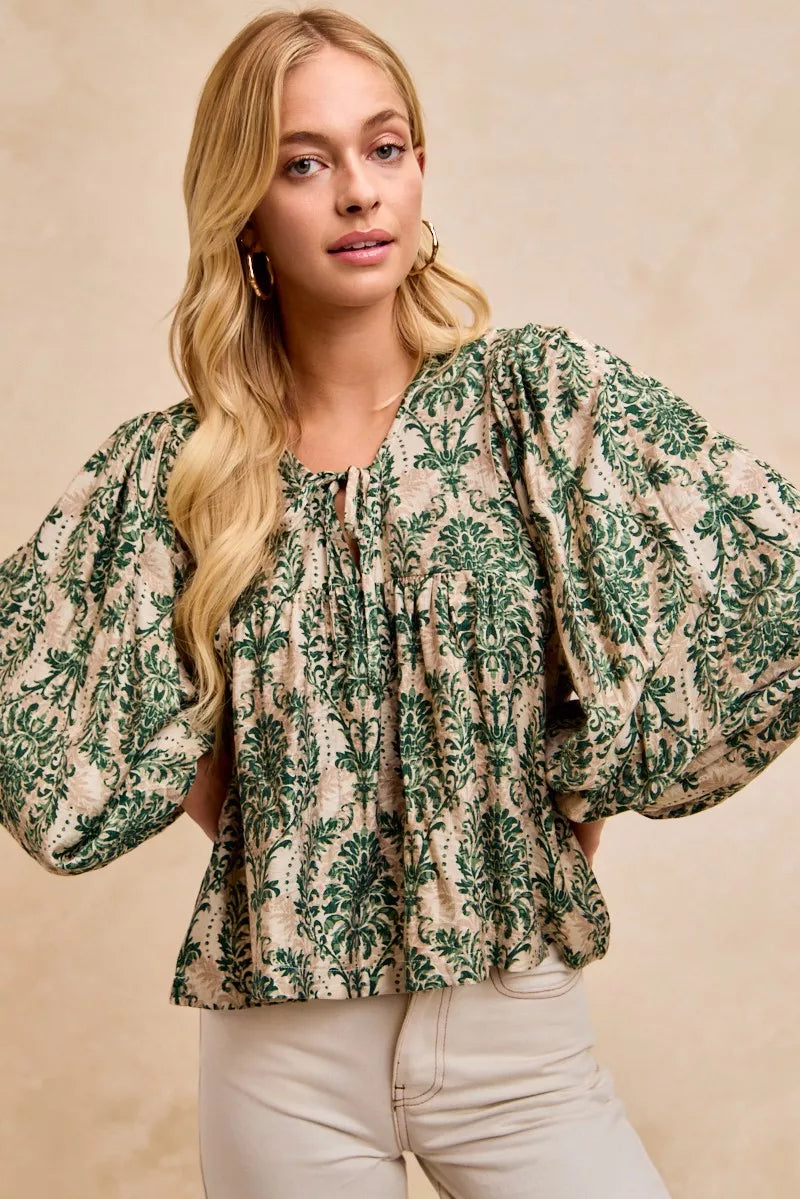 Printed Balloon Sleeve Front Tied Blouse-The printed woven front tied blouse with balloon sleeves is a stylish and feminine choice for adding a touch of flair to your outfit creating a flattering silhouette.