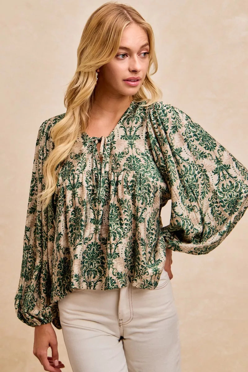 Printed Balloon Sleeve Front Tied Blouse-The printed woven front tied blouse with balloon sleeves is a stylish and feminine choice for adding a touch of flair to your outfit creating a flattering silhouette.
