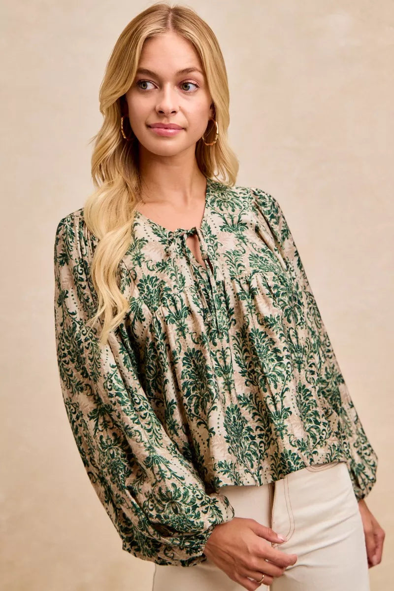 Printed Balloon Sleeve Front Tied Blouse-The printed woven front tied blouse with balloon sleeves is a stylish and feminine choice for adding a touch of flair to your outfit creating a flattering silhouette.