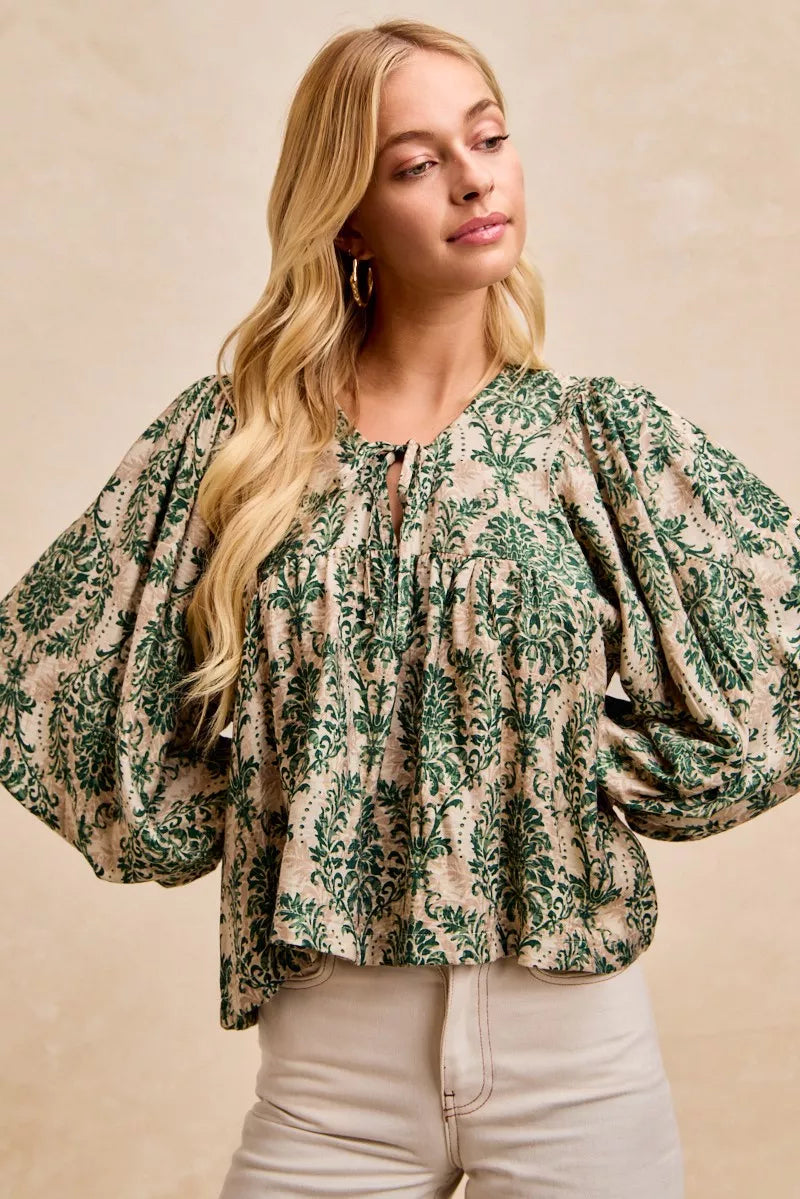 Printed Balloon Sleeve Front Tied Blouse-The printed woven front tied blouse with balloon sleeves is a stylish and feminine choice for adding a touch of flair to your outfit creating a flattering silhouette.