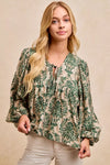 Printed Balloon Sleeve Front Tied Blouse-The printed woven front tied blouse with balloon sleeves is a stylish and feminine choice for adding a touch of flair to your outfit creating a flattering silhouette.