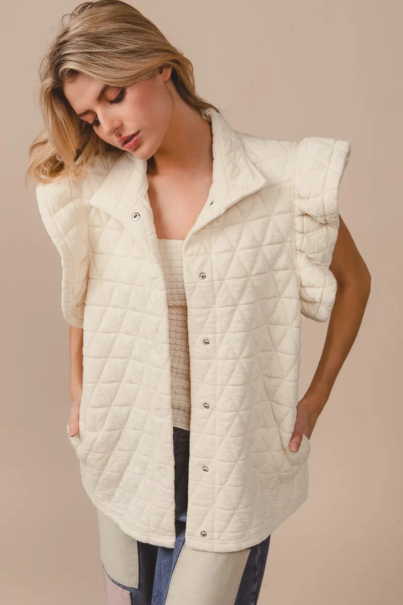 Quilted Knit Ruffle Sleeve Vest, Oatmeal-Oatmeal quilted ruffle sleeve vest with diamond pattern, button front, and collared design. Neutral lightweight layering piece for chic fall and spring outfits.-Reef Love