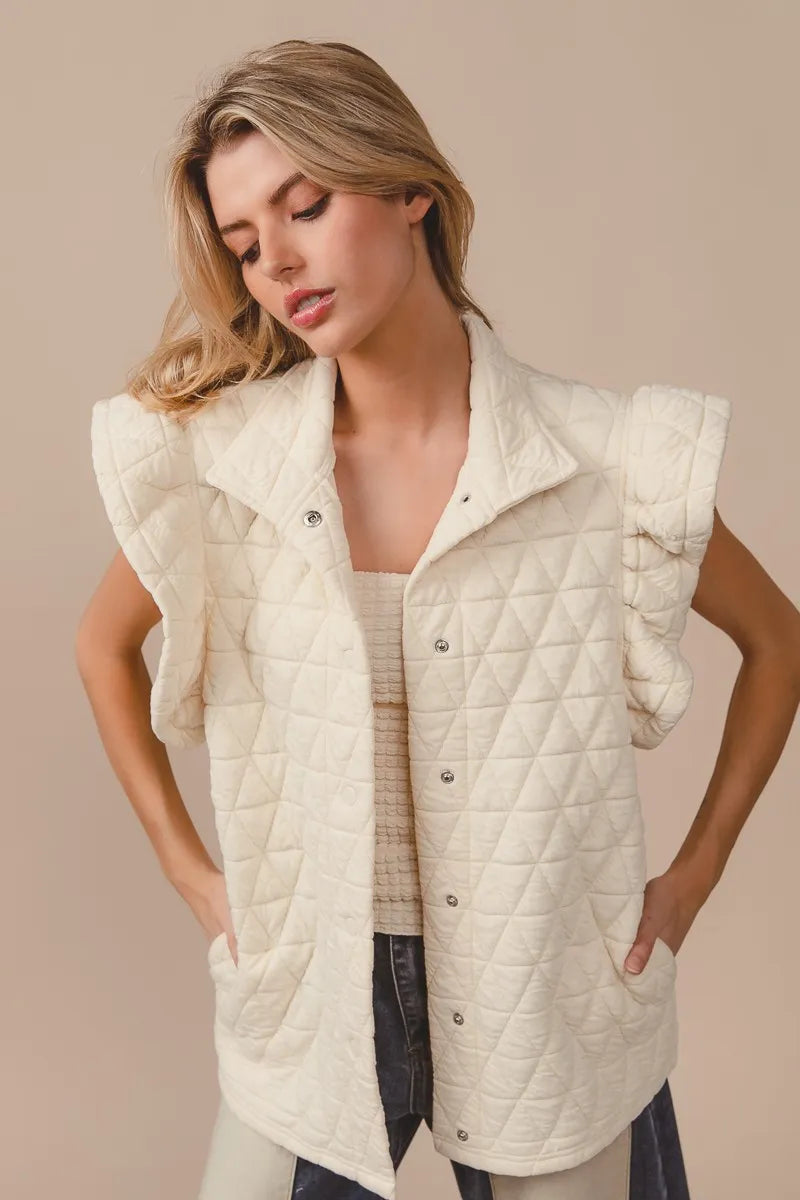 Quilted Knit Ruffle Sleeve Vest, Oatmeal-Oatmeal quilted ruffle sleeve vest with diamond pattern, button front, and collared design. Neutral lightweight layering piece for chic fall and spring outfits.-Reef Love