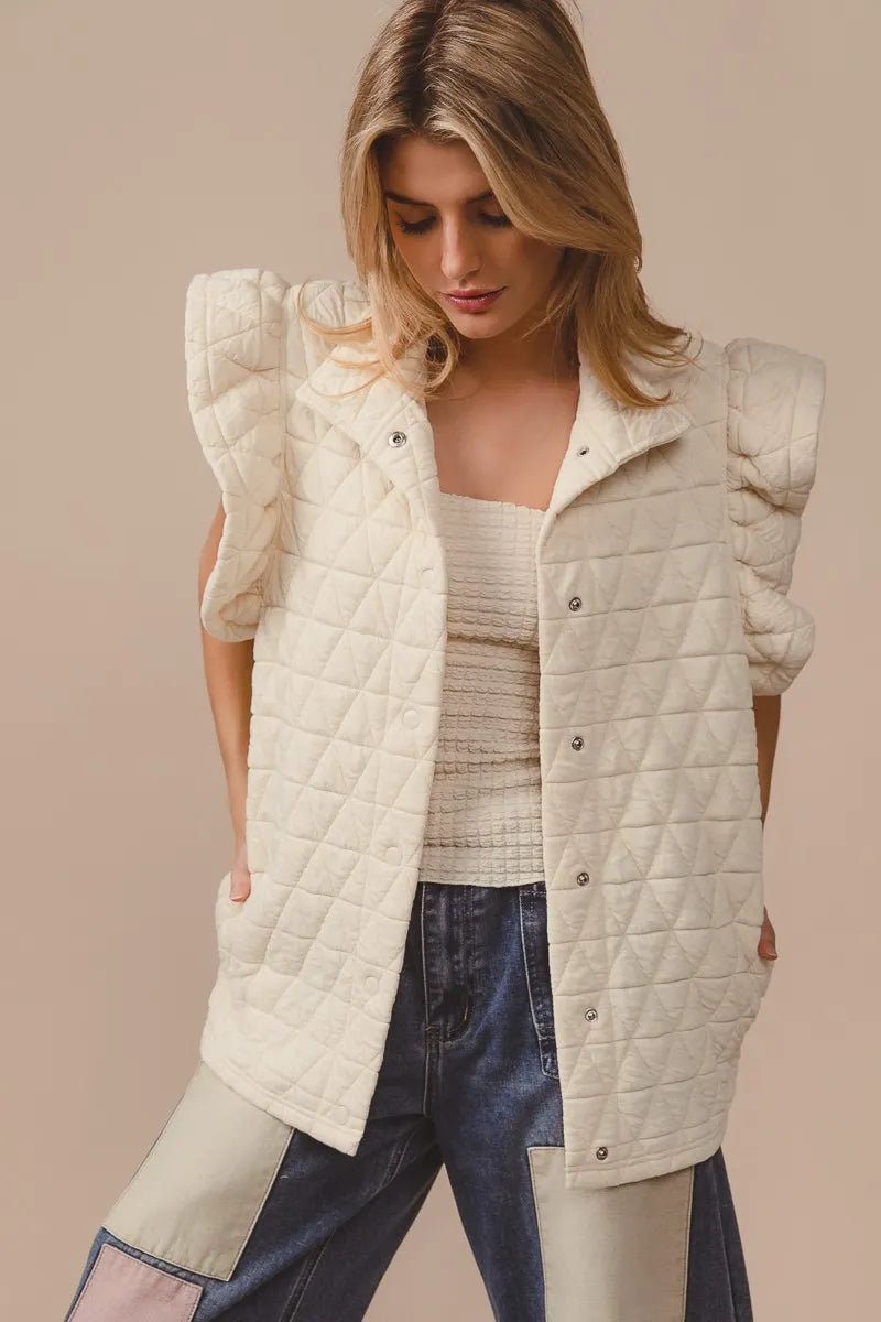 Quilted Knit Ruffle Sleeve Vest, Oatmeal-Oatmeal quilted ruffle sleeve vest with diamond pattern, button front, and collared design. Neutral lightweight layering piece for chic fall and spring outfits.-Reef Love