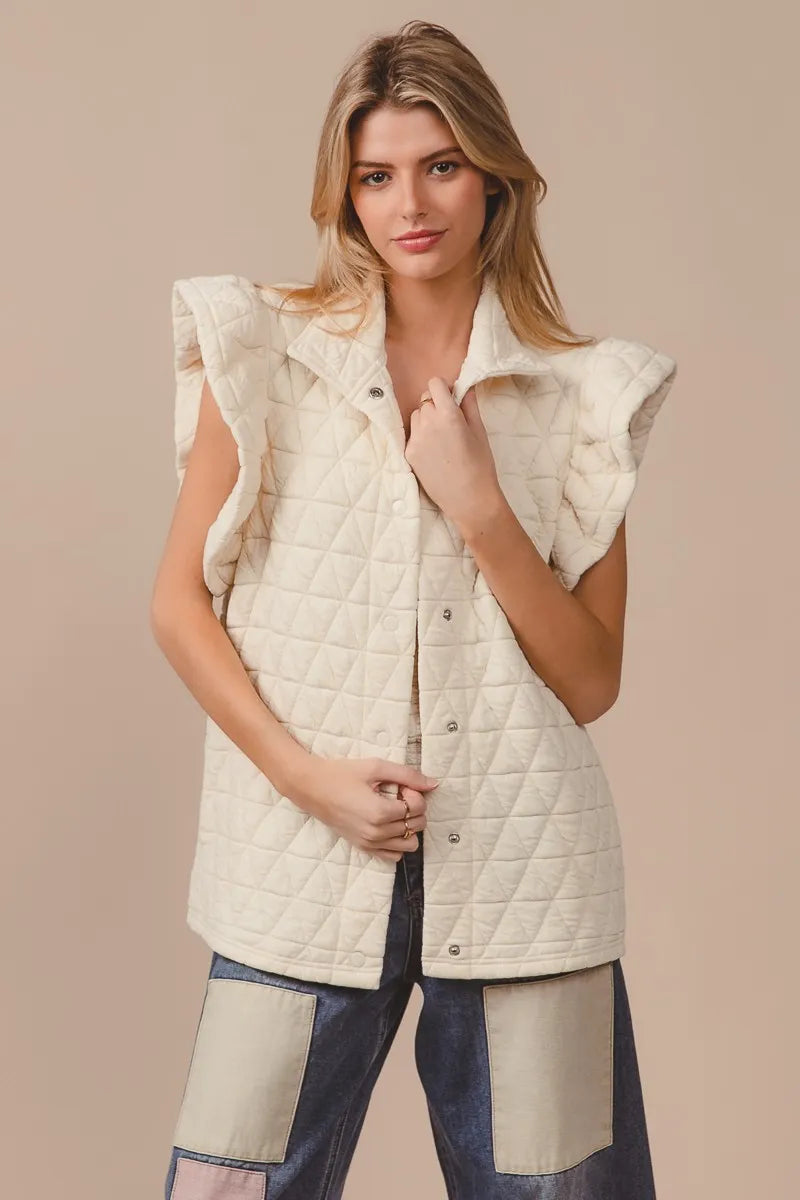 Quilted Knit Ruffle Sleeve Vest, Oatmeal-Oatmeal quilted ruffle sleeve vest with diamond pattern, button front, and collared design. Neutral lightweight layering piece for chic fall and spring outfits.-Reef Love