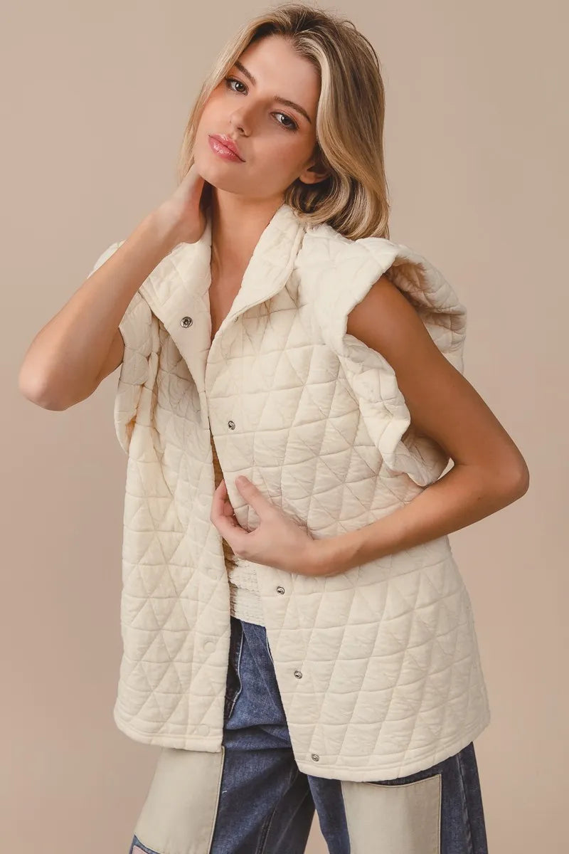 Quilted Knit Ruffle Sleeve Vest, Oatmeal-Oatmeal quilted ruffle sleeve vest with diamond pattern, button front, and collared design. Neutral lightweight layering piece for chic fall and spring outfits.-Reef Love