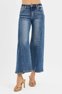 RISEN High Rise Crop Wide Leg Jeans with Step Hem-Elevate your denim game with these High Rise Crop Wide Leg Jeans featuring a trendy step hem detail. The high-rise silhouette offers a flattering fit.