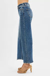 RISEN High Rise Crop Wide Leg Jeans with Step Hem-Elevate your denim game with these High Rise Crop Wide Leg Jeans featuring a trendy step hem detail. The high-rise silhouette offers a flattering fit.