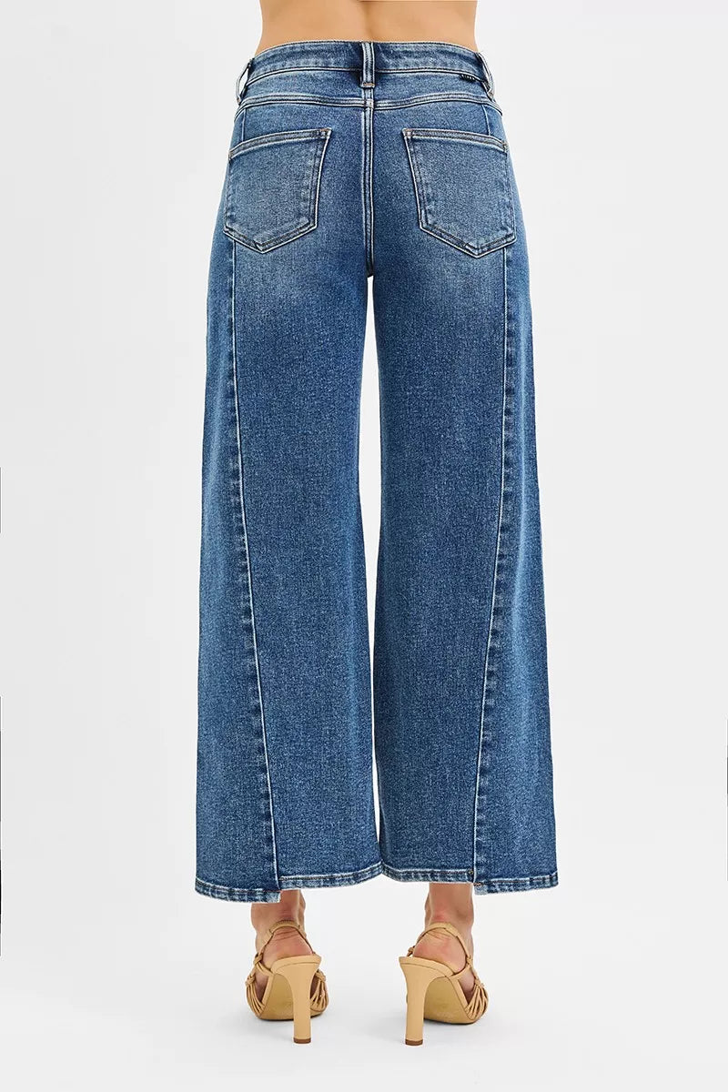 RISEN High Rise Crop Wide Leg Jeans with Step Hem-Elevate your denim game with these High Rise Crop Wide Leg Jeans featuring a trendy step hem detail. The high-rise silhouette offers a flattering fit.