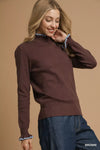 Ribbed Sweater with Ruffle Contrast Trim-Ribbed Sweater in Brown with Blue Ruffle Contrast Trim. Pair it with high-waisted trousers or a skirt for a sophisticated and chic ensemble. 