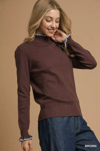 Ribbed Sweater with Ruffle Contrast Trim-Ribbed Sweater in Brown with Blue Ruffle Contrast Trim. Pair it with high-waisted trousers or a skirt for a sophisticated and chic ensemble. 