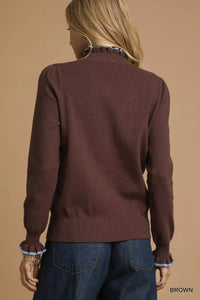 Ribbed Sweater with Ruffle Contrast Trim-Ribbed Sweater in Brown with Blue Ruffle Contrast Trim. Pair it with high-waisted trousers or a skirt for a sophisticated and chic ensemble. 
