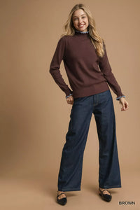 Ribbed Sweater with Ruffle Contrast Trim-Ribbed Sweater in Brown with Blue Ruffle Contrast Trim. Pair it with high-waisted trousers or a skirt for a sophisticated and chic ensemble. 