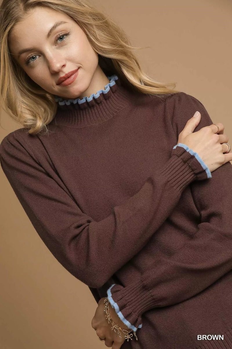 Ribbed Sweater with Ruffle Contrast Trim-Ribbed Sweater in Brown with Blue Ruffle Contrast Trim. Pair it with high-waisted trousers or a skirt for a sophisticated and chic ensemble. 
