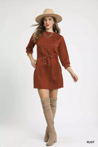 Rust Drawstring Cable Knit Mini Dress-Rust Drawstring Cable Knit Mini Dress. This cable knit mini dress features a drawstring waist and convenient pockets for a cozy and practical look. 