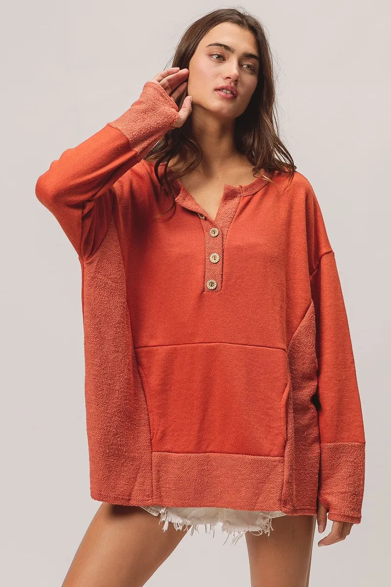 Rust French Terry Knit Side Block Buttoned Henley Top-Rust French terry Henley top with side block detail and button accents. Oversized, cozy knit with pockets—perfect for casual fall outfits or lounging.-Reef Love