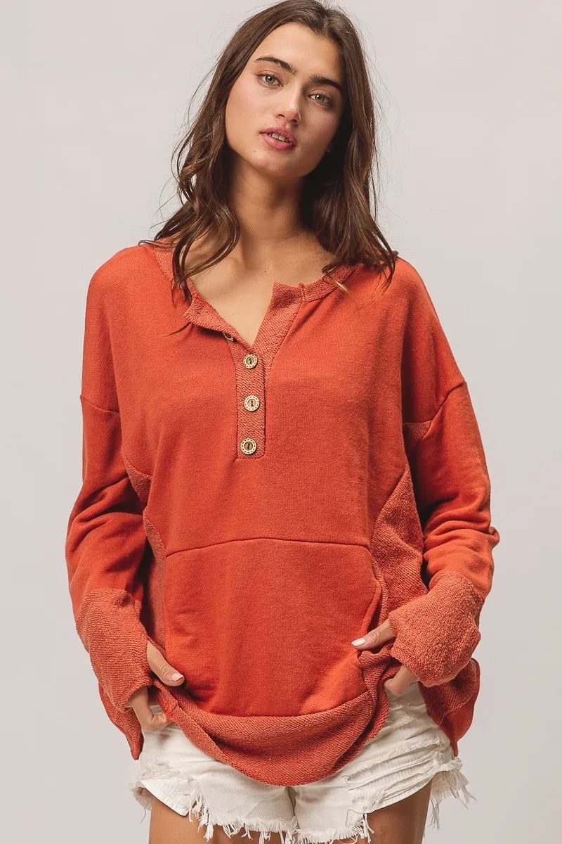 Rust French Terry Knit Side Block Buttoned Henley Top-Rust French terry Henley top with side block detail and button accents. Oversized, cozy knit with pockets—perfect for casual fall outfits or lounging.-Reef Love