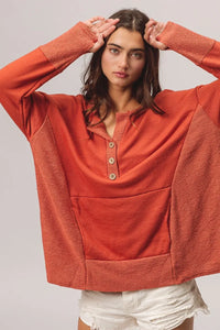 Rust French Terry Knit Side Block Buttoned Henley Top-Rust French terry Henley top with side block detail and button accents. Oversized, cozy knit with pockets—perfect for casual fall outfits or lounging.-Reef Love