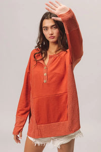 Rust French Terry Knit Side Block Buttoned Henley Top-Rust French terry Henley top with side block detail and button accents. Oversized, cozy knit with pockets—perfect for casual fall outfits or lounging.-Reef Love