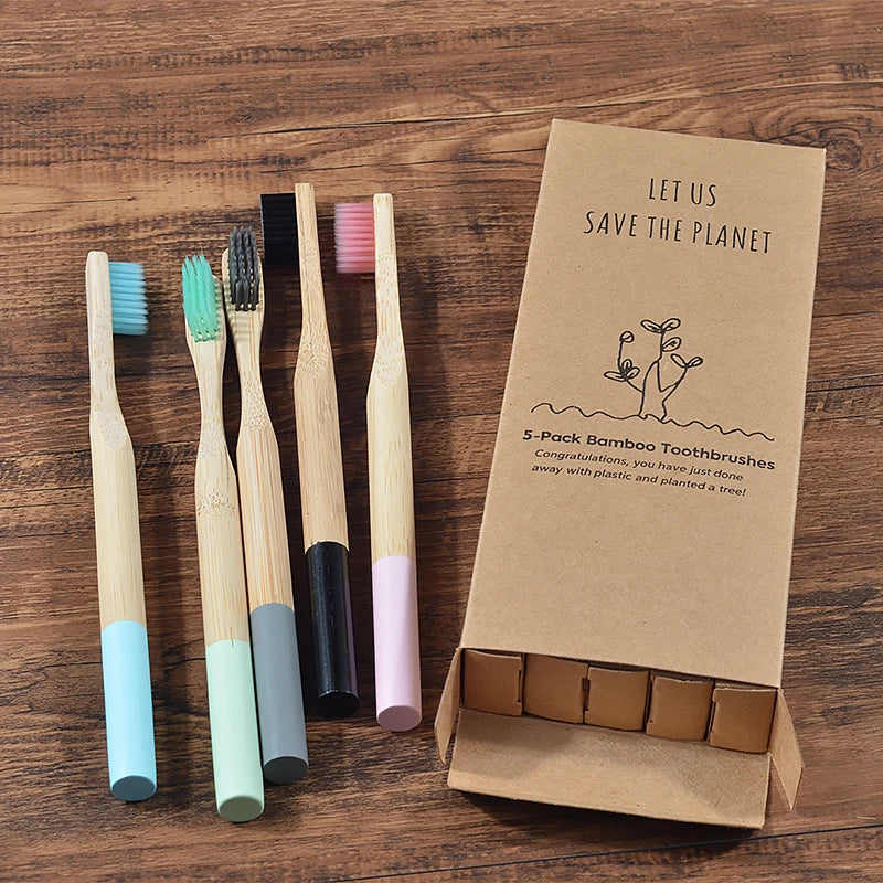 Woman wearing 5 Pack Adult Bamboo Toothbrush Medium Bristles Eco Friendly-5-pack bamboo toothbrush set with biodegradable handles & medium BPA-free bristles. Eco-friendly, vegan, plastic-free & individually packaged.