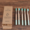 Woman wearing 5 Pack Adult Bamboo Toothbrush Medium Bristles Eco Friendly-5-pack bamboo toothbrush set with biodegradable handles & medium BPA-free bristles. Eco-friendly, vegan, plastic-free & individually packaged.