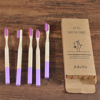 Woman wearing 5 Pack Adult Bamboo Toothbrush Medium Bristles Eco Friendly-5-pack bamboo toothbrush set with biodegradable handles & medium BPA-free bristles. Eco-friendly, vegan, plastic-free & individually packaged.