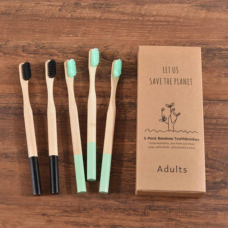 Woman wearing 5 Pack Adult Bamboo Toothbrush Medium Bristles Eco Friendly-5-pack bamboo toothbrush set with biodegradable handles & medium BPA-free bristles. Eco-friendly, vegan, plastic-free & individually packaged.