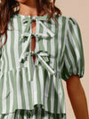 Shop Sage Front Tie Stripe Top and Wide Leg Pants Set-Sage & White Striped Tie-Front Blouse & Wide-Leg Pants Set – Effortless Summer Style Brighten your warm-weather wardrobe with polished Sage & White Stripes.-available at Reef Love online boho-chic boutique
