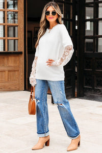 woman wearing the Samantha Lace Sleeve Two - piece Fuzzy Sweater with jeans - Reef Love