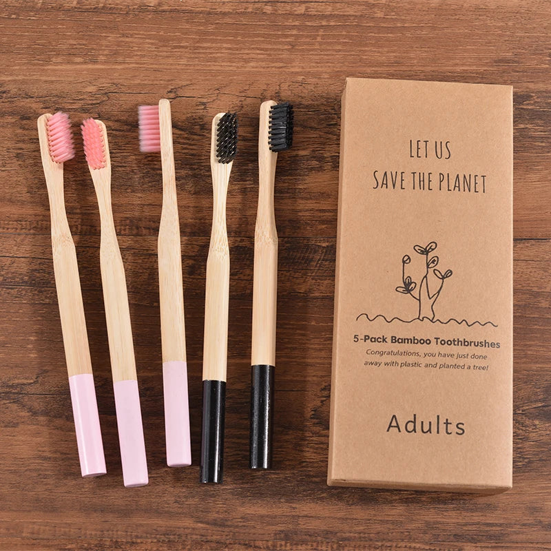 Woman wearing 5 Pack Adult Bamboo Toothbrush Medium Bristles Eco Friendly-5-pack bamboo toothbrush set with biodegradable handles & medium BPA-free bristles. Eco-friendly, vegan, plastic-free & individually packaged.