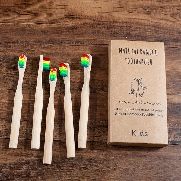 Woman wearing 5 Pack Adult Bamboo Toothbrush Medium Bristles Eco Friendly-5-pack bamboo toothbrush set with biodegradable handles & medium BPA-free bristles. Eco-friendly, vegan, plastic-free & individually packaged.
