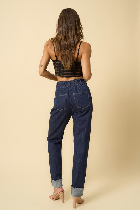 Super High Rise Roll Up Slouch Jeans-Super high rise roll up slouch jeans in dark wash. Relaxed non-stretch denim with elastic waist & raw hem. Easygoing boho-chic denim style.