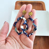 Shop Talia Earrings - Twilight-Talia Earrings in Twilight feature deep blue, copper, and white marbled acrylic. Lightweight, bold, and hypoallergenic—no two pairs are exactly alike.-available at Reef Love online boho-chic boutique