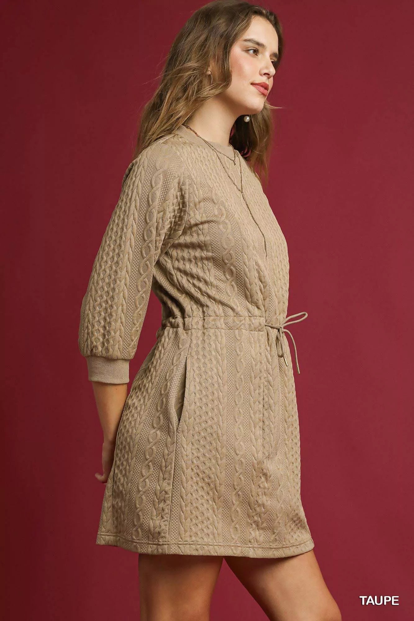Taupe Drawstring Cable Knit Mini Dress-Taupe Drawstring Cable Knit Mini Dress with Pockets. This cable knit mini dress features a drawstring waist and convenient pockets for a cozy and practical look.